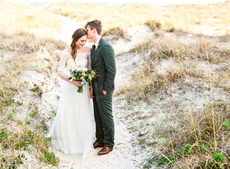 Bride and Groom in wrightsville beach dunes