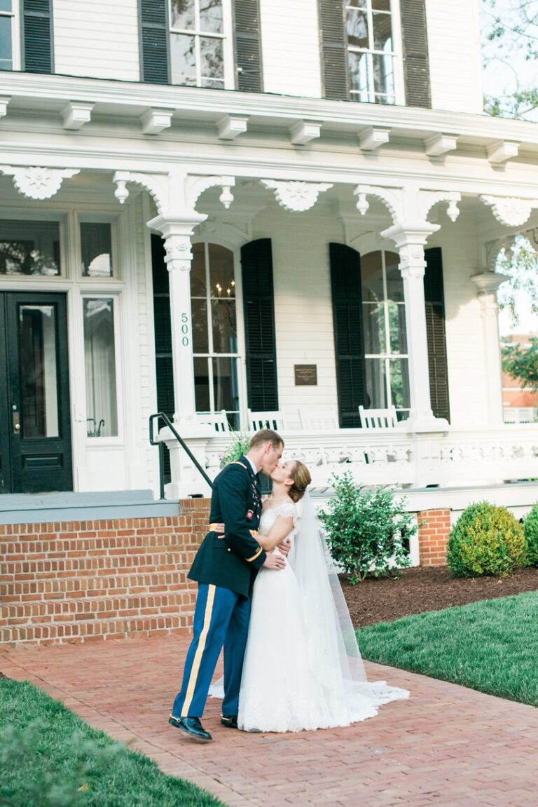Bride and Groom in Army uniform special moment kissing at Merrimon Wynne Casey Rose