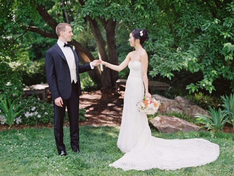 Bride and Groom hold hands at Duke Gardens Casey Rose_1