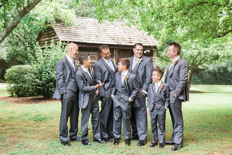 Groomsmen-in-charcoal-grey-suits-at-wedding-at-The-Sutherland-in-NC-bowtie-collaborative