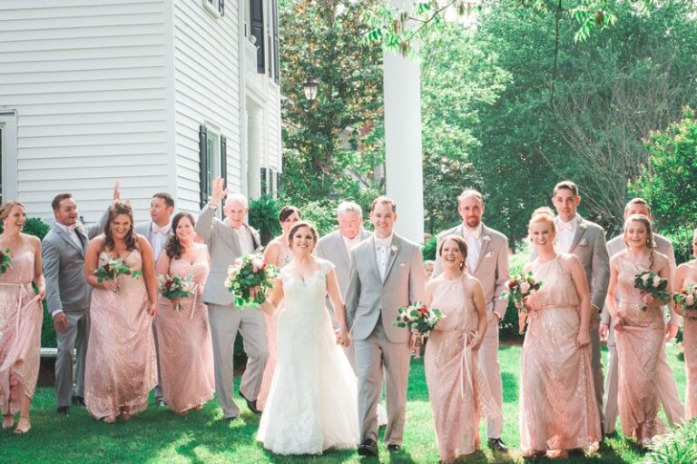 Bride and Groom with Grey and Blush wedding party attire at wedding at The Matthews House, Cary NC, Fancy This