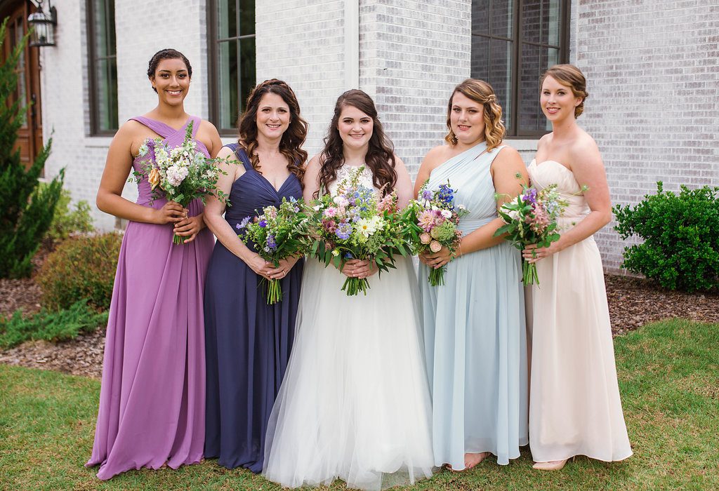 Bridesmaids in mismatching long gowns for wedding at The Bradford, Raleigh Wedding Venue, Johanna Dye