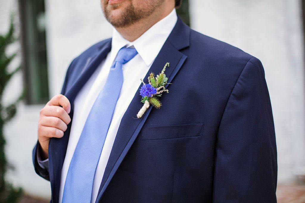 Groom in Navy Suit with Perriwinkle tie at wedding at The Bradford, Raleigh Wedding Venue, Johanna Dye