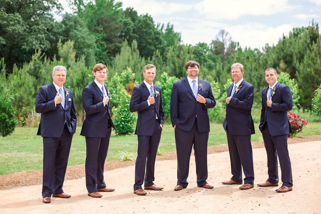 Groomsman in navy suits outside at The Bradford, Raleigh Wedding Venue, Johanna Dye