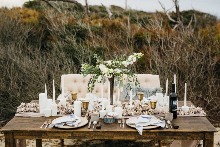 Winter Table inspiration with mixed candles, oyster shells, on obx beach, Sarah D'Ambra Photography