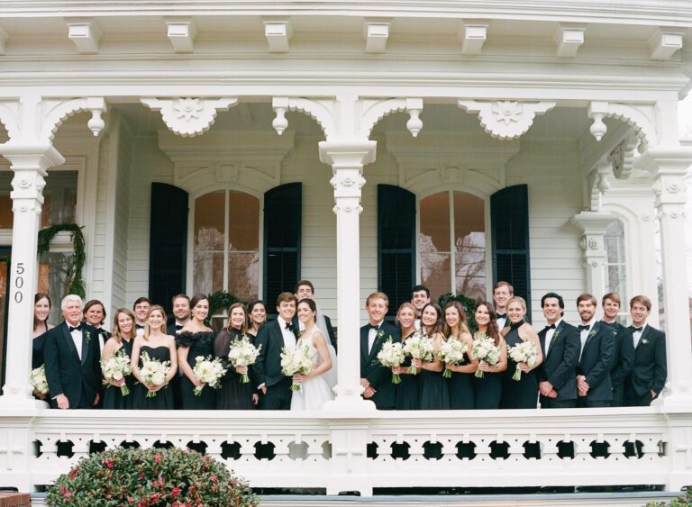Merrimon-Wynne House photo on the porch new year's eve wedding in Raleigh