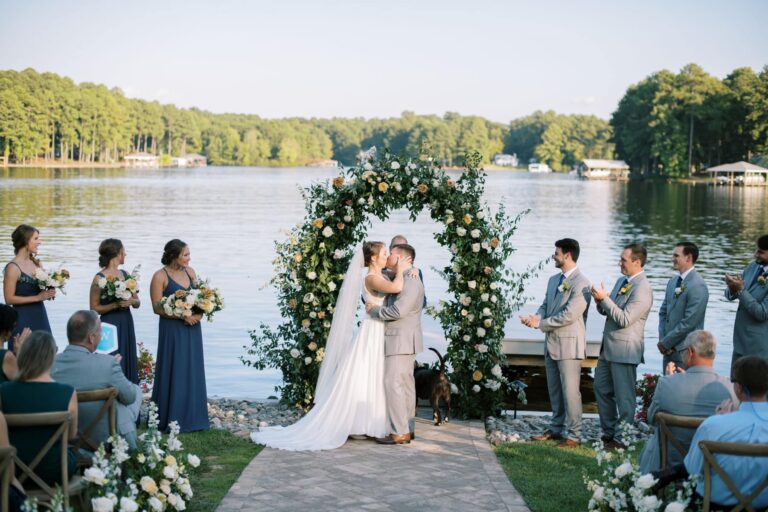 Lakeside wedding ceremony floral arch
