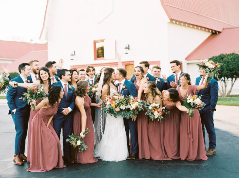Emmie Isaiah BPF Winston-Salem wedding party couple kiss fall inspired wedding Danielle Flake Photography 10 2